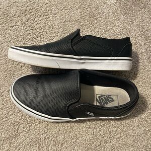 Perforated black slip on Vans